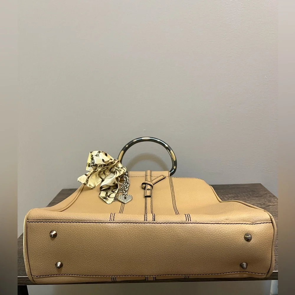 Tan leather tote with acrylic handles by Christine deGennaro